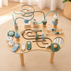 Table d’éveil en bois vue de dessus avec ses activités